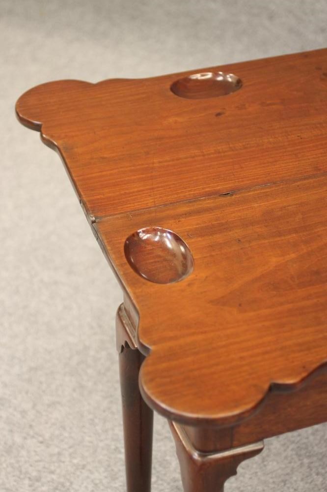 A GEORGIAN MAHOGANY FOLDING CARD TABLE Image