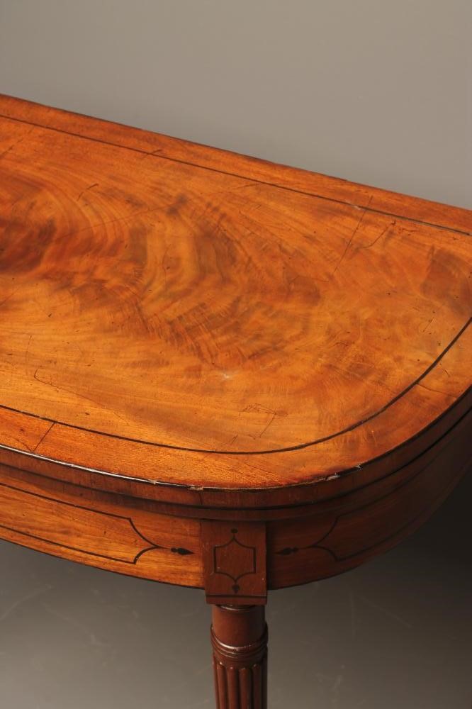 A mahogany folding card table Hartleys Auctioneers & Valuers