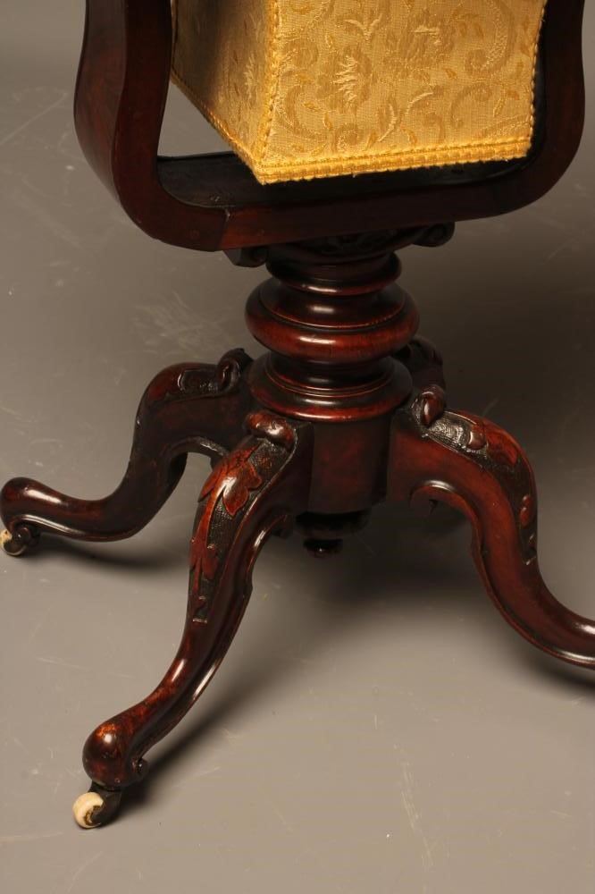 A VICTORIAN WALNUT WORK TABLE of oblong serpentine form Image