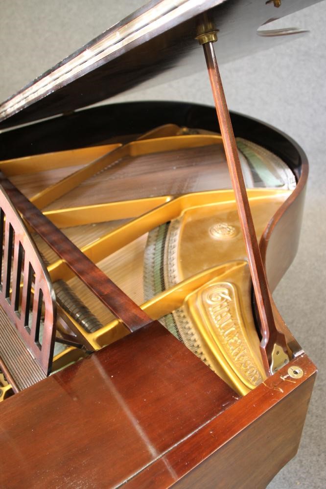 A CHALLEN BABY GRAND PIANO in mahogany case with arched slatted music stand Image