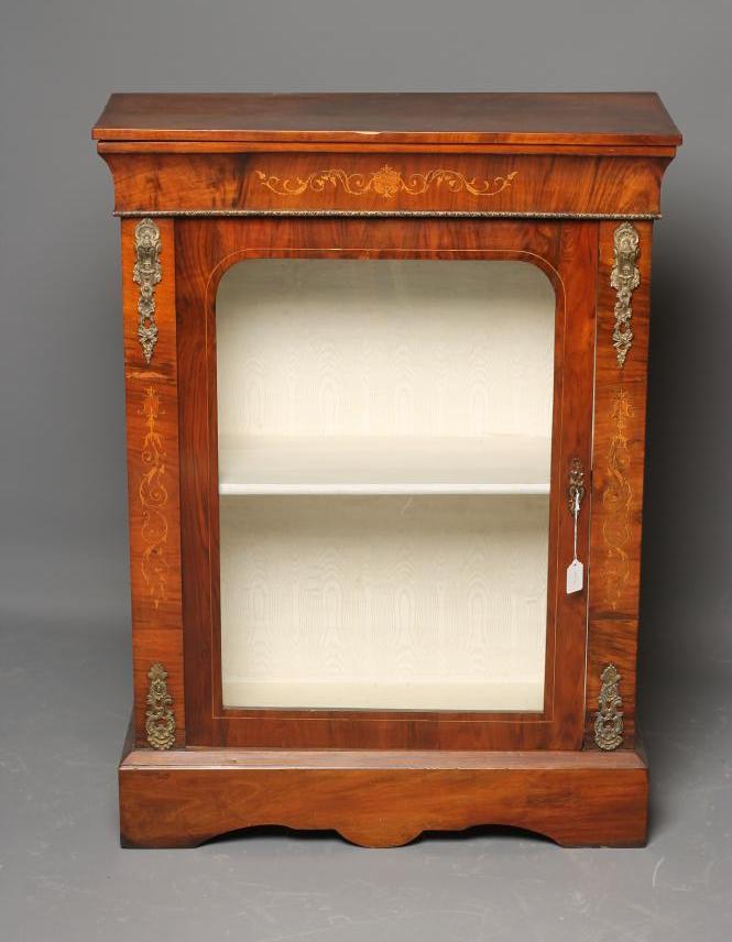 A VICTORIAN WALNUT GLAZED PIER CABINET of oblong form with foliate marquetry Image