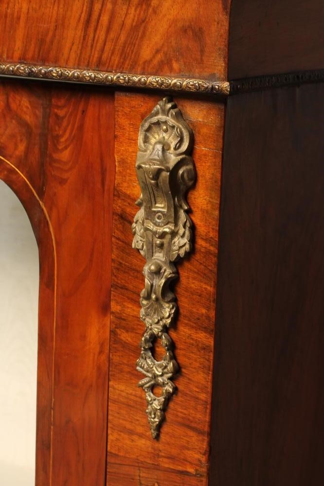 A VICTORIAN WALNUT GLAZED PIER CABINET of oblong form with foliate marquetry Image