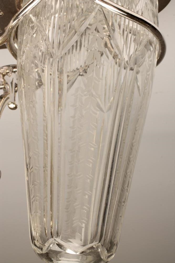 AN EDWARDIAN EPNS TRIPLE DECANTER STAND Image