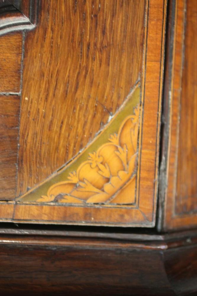 A GEORGIAN OAK AND SATINWOOD BANDED CORNER CUPBOARD Image