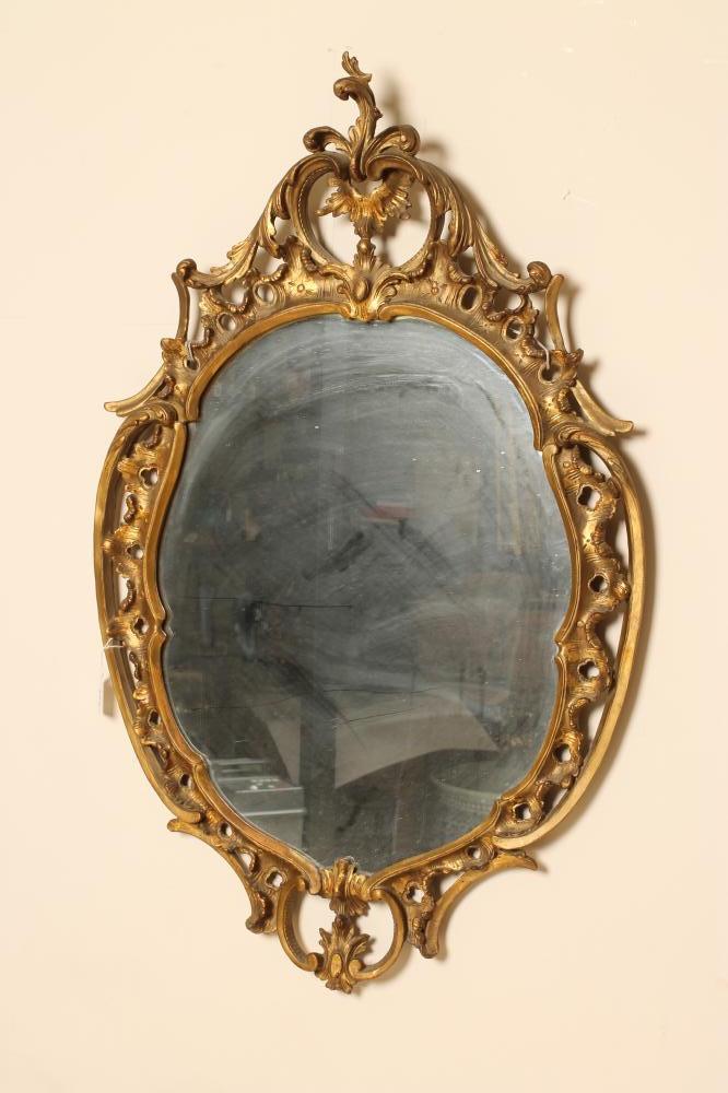A CARVED AND GILDED ROCOCO PIER GLASS Image