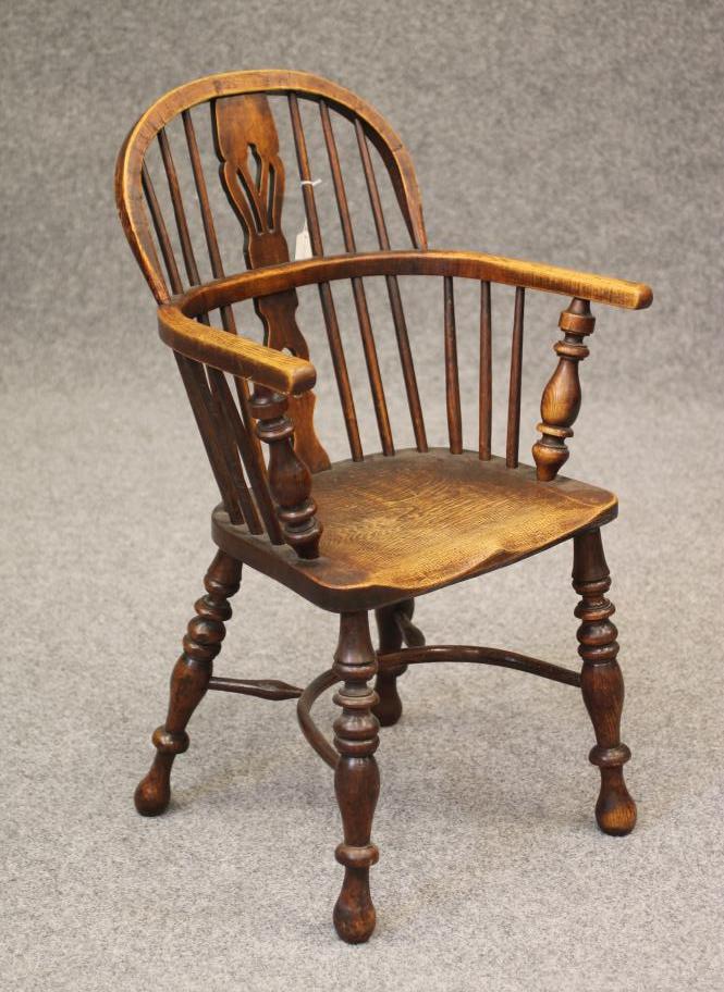 AN ASH AND ELM WINDSOR ARMCHAIR Image