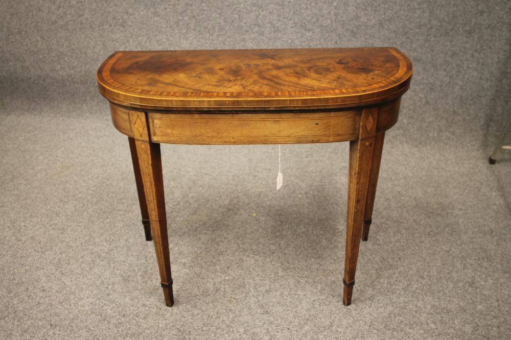 A GEORGIAN MAHOGANY FOLDING CARD TABLE Image