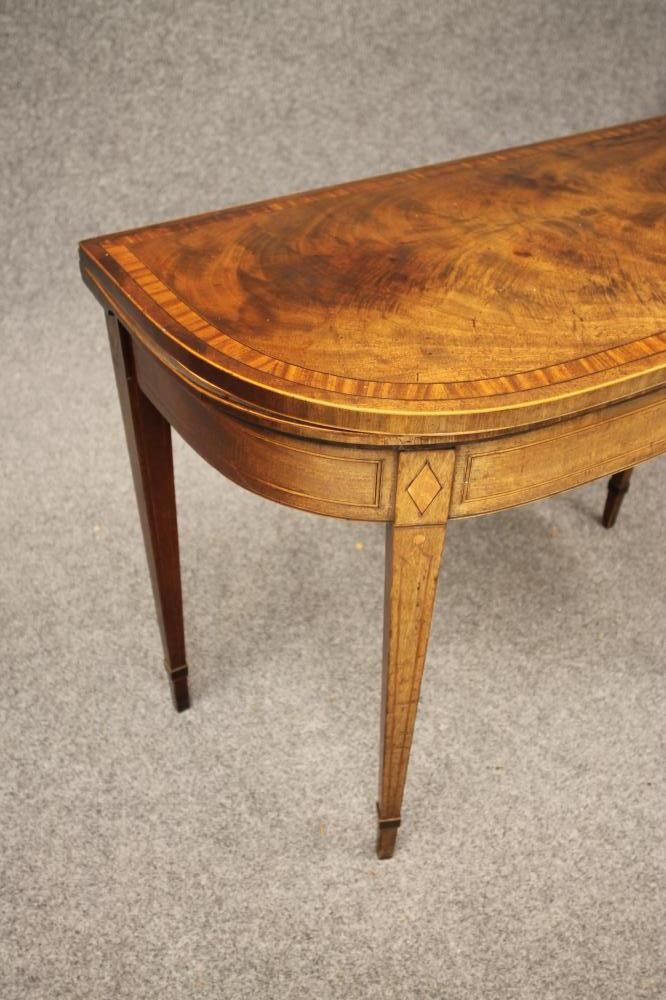 A GEORGIAN MAHOGANY FOLDING CARD TABLE Image
