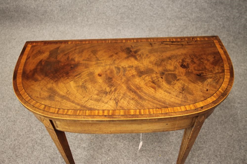 A GEORGIAN MAHOGANY FOLDING CARD TABLE Image