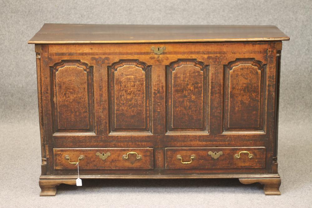 A GEORGIAN OAK AND WALNUT BANDED PANELLED CHEST Image