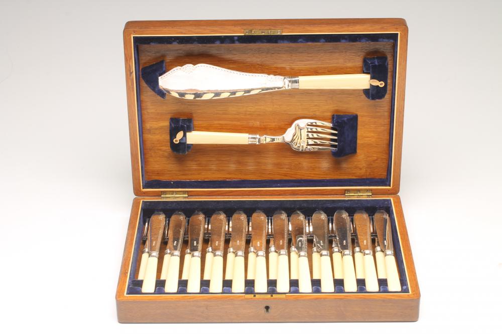 A SET OF TWELVE EDWARDIAN EPNS FISH KNIVES Image