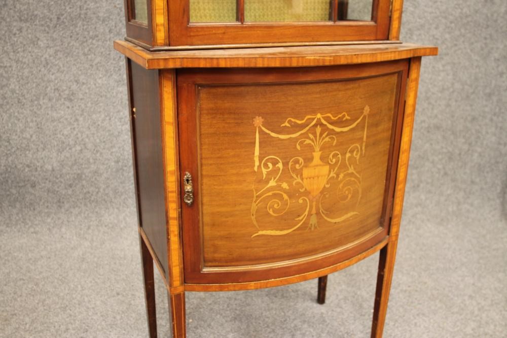 AN EDWARDIAN MAHOGANY AND MARQUETRY INLAID PIER DISPLAY CABINET Image