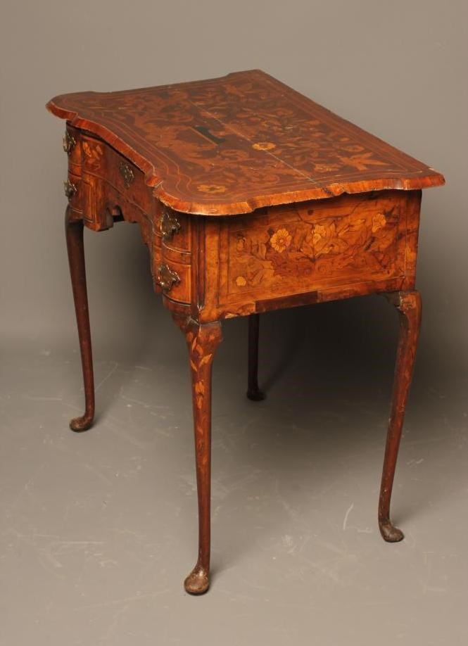 A DUTCH WALNUT FLORAL MARQUETRY LOWBOY Image