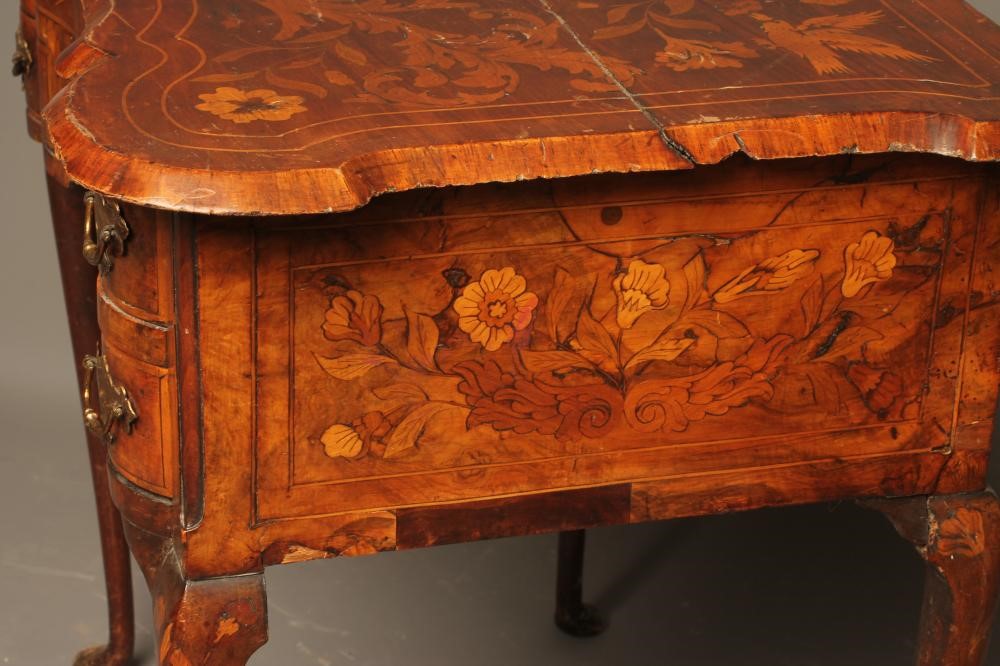 A DUTCH WALNUT FLORAL MARQUETRY LOWBOY Image