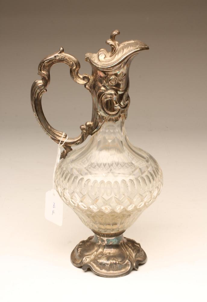 AN EPNS MOUNTED CLEAR GLASS CLARET JUG Image