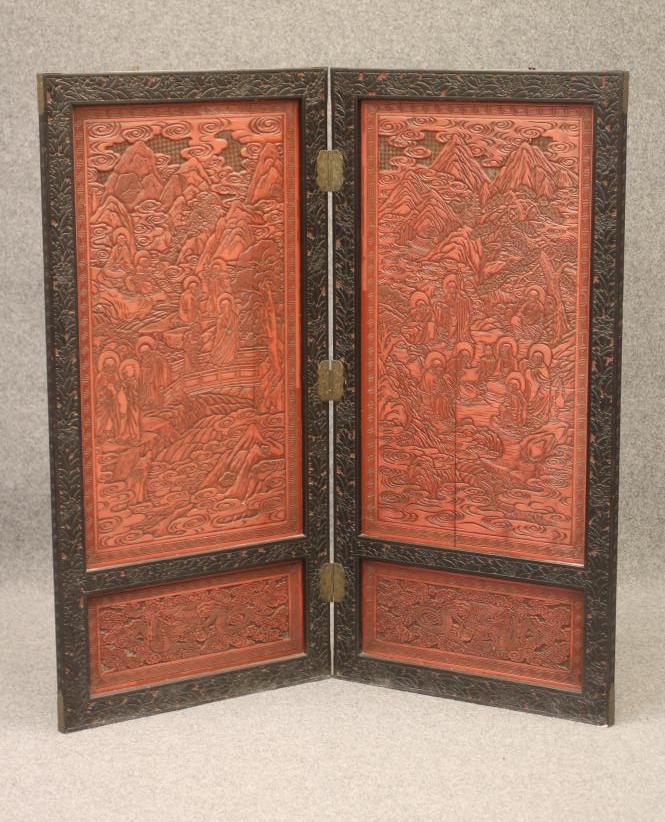 A CHINESE EBONISED WOOD FOLDING TWO SECTION ROOM SCREEN Image