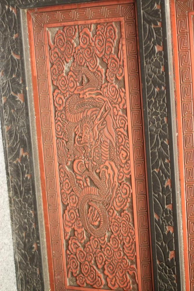 A CHINESE EBONISED WOOD FOLDING TWO SECTION ROOM SCREEN Image