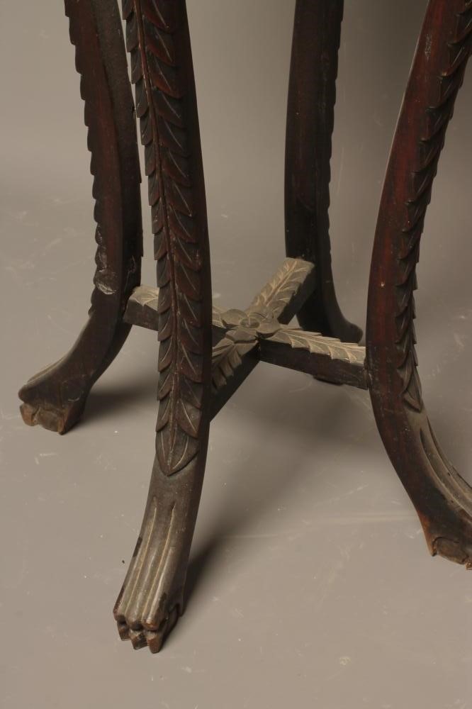 A CHINESE CARVED HARDWOOD JARDINIERE STAND of circular form inlaid with trailing foliage in mother Image