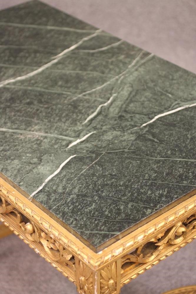 A LOUIS XVI STYLE GILTWOOD CENTRE TABLE Image