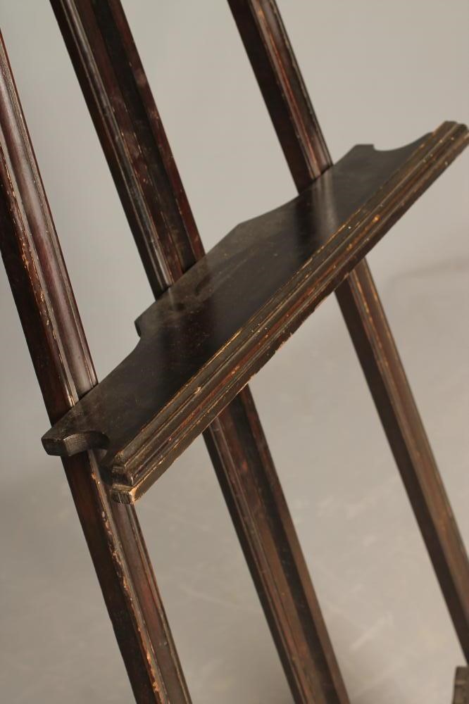A VICTORIAN STAINED WOOD ARTIST EASEL in the Rococo Revival style Image