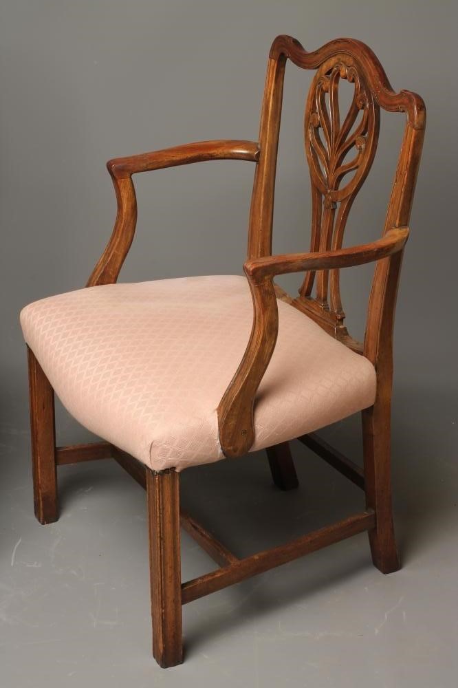 A PAIR OF GEORGIAN HEPPLEWHITE MAHOGANY ELBOW CHAIRS Image