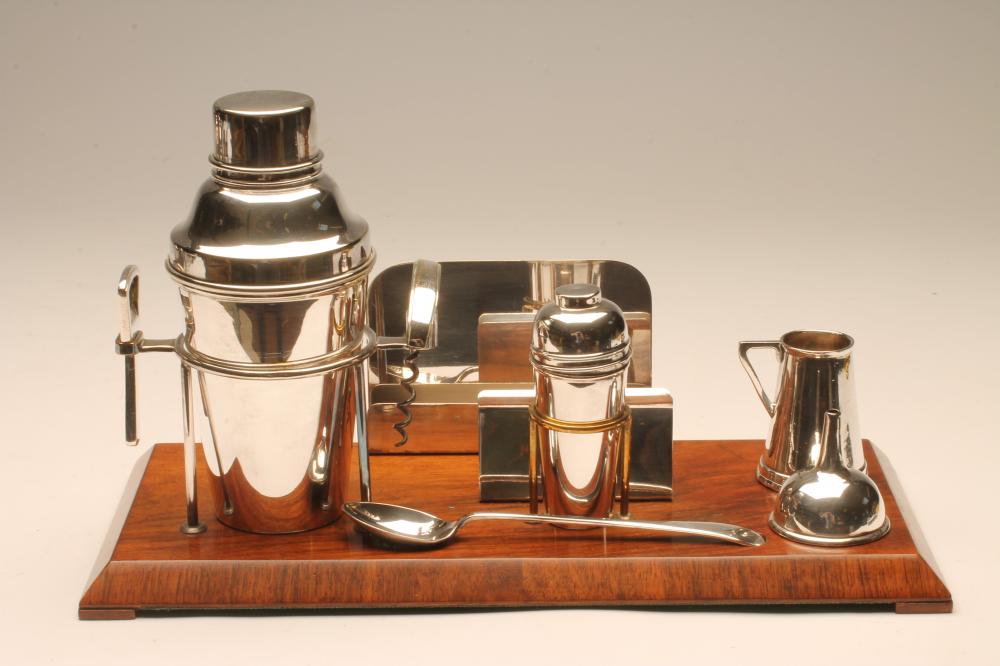 AN ART DECO WALNUT COCKTAIL STAND Image