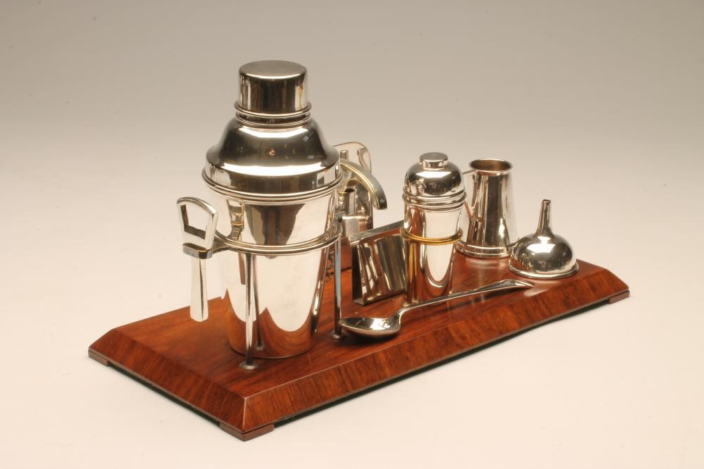 AN ART DECO WALNUT COCKTAIL STAND Image