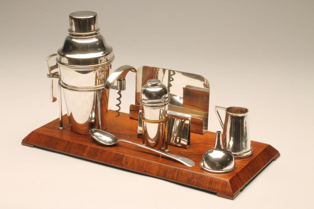 AN ART DECO WALNUT COCKTAIL STAND Image