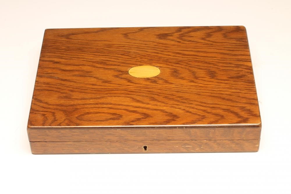 *A SET OF SIX PAIRS OF SILVER FISH KNIVES AND FORKS WITH MATCHING SERVERS Image