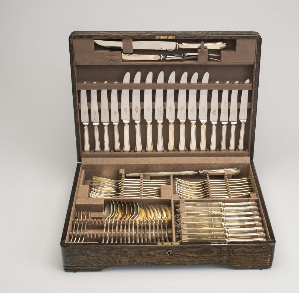 A SILVER TABLE SERVICE FOR EIGHT PLACE SETTINGS Image