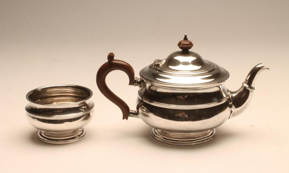 *A SILVER TEAPOT AND SUGAR BASIN Image