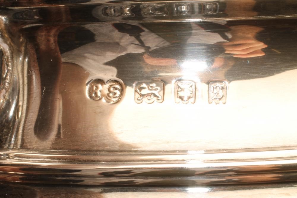 *A SILVER TEAPOT AND SUGAR BASIN Image