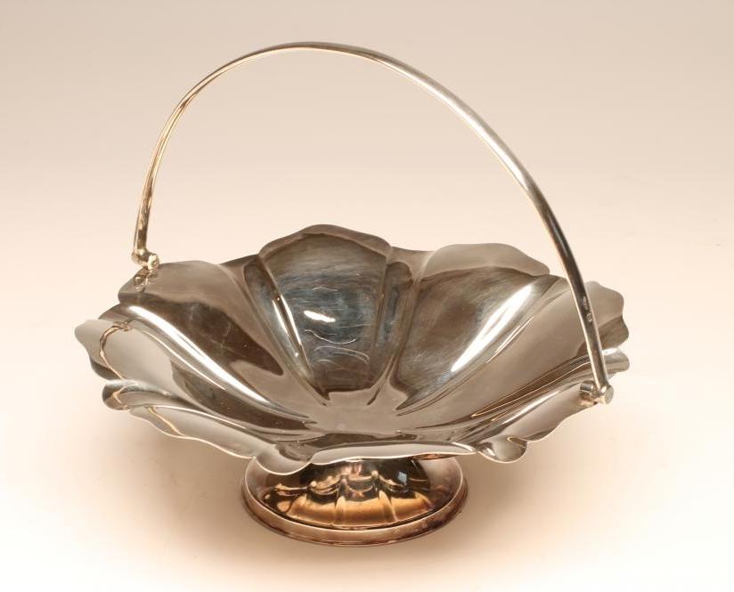 A SILVER CAKE BASKET Image