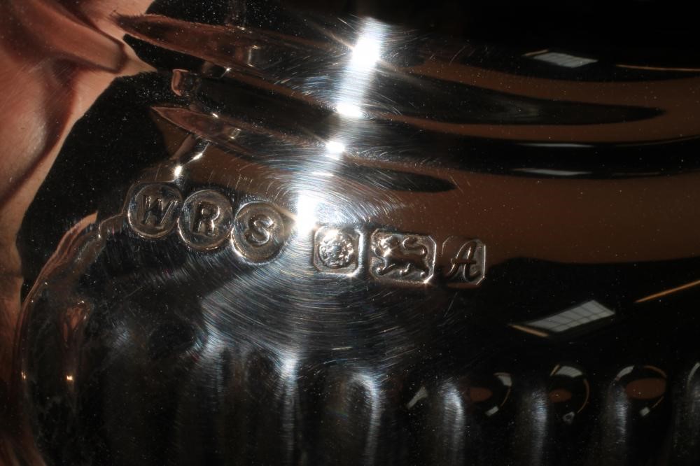 *A SILVER FOUR PIECE TEA AND COFFEE SERVICE Image