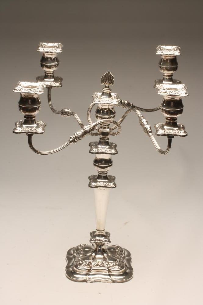 A SILVER FOUR BRANCH FIVE LIGHT CANDELABRUM Image