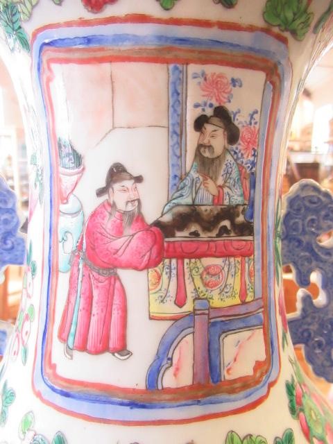 A CANTONESE PORCELAIN FAMILLE ROSE TWO HANDLED ROULEAU VASE painted with two panels of court Image