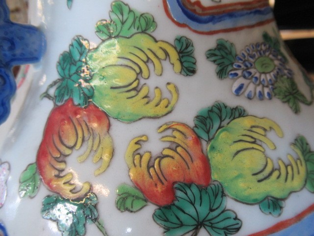 A CANTONESE PORCELAIN FAMILLE ROSE TWO HANDLED ROULEAU VASE painted with two panels of court Image