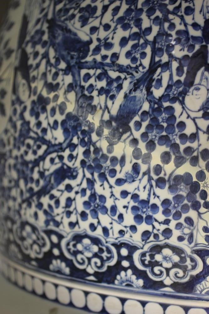 A LARGE CHINESE PORCELAIN JARDINIERE of baluster form painted in underglaze blue with panels of Image