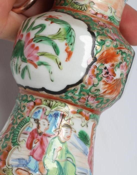 A CANTONESE PORCELAIN FAMILLE ROSE SMALL GU VASE painted with panels of figures, flowers and birds Image