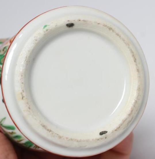 A CANTONESE PORCELAIN FAMILLE ROSE SMALL GU VASE painted with panels of figures, flowers and birds Image