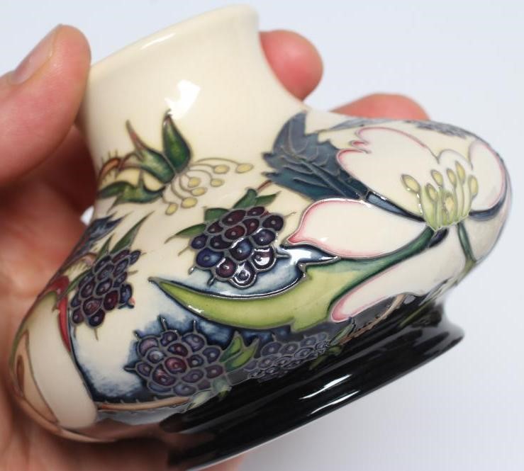 A MOORCROFT POTTERY VASE Image