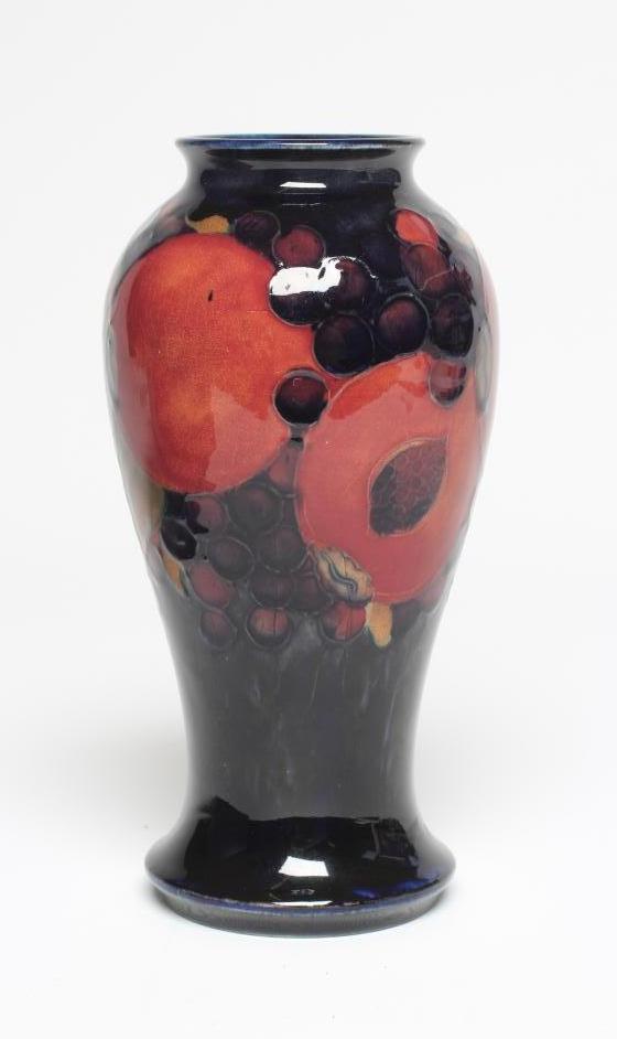 A MOORCROFT POTTERY POMEGRANATE VASE, 1928-1949, of inverted baluster form, painted in typical Image