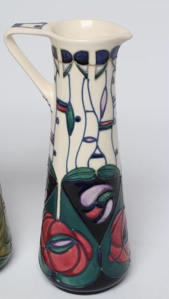 THREE MOORCROFT POTTERY EWERS Image