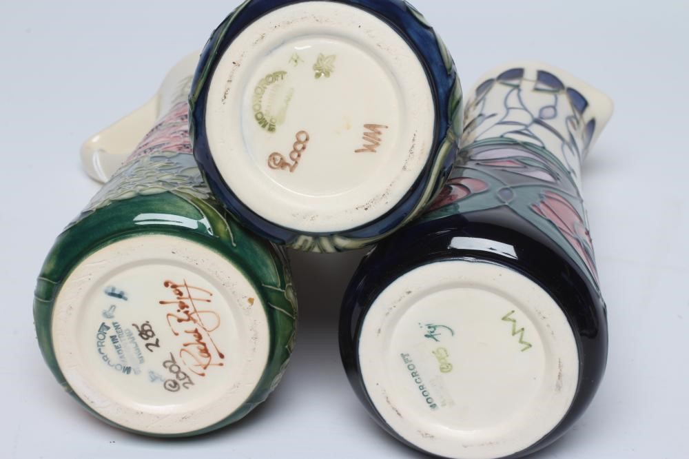THREE MOORCROFT POTTERY EWERS Image