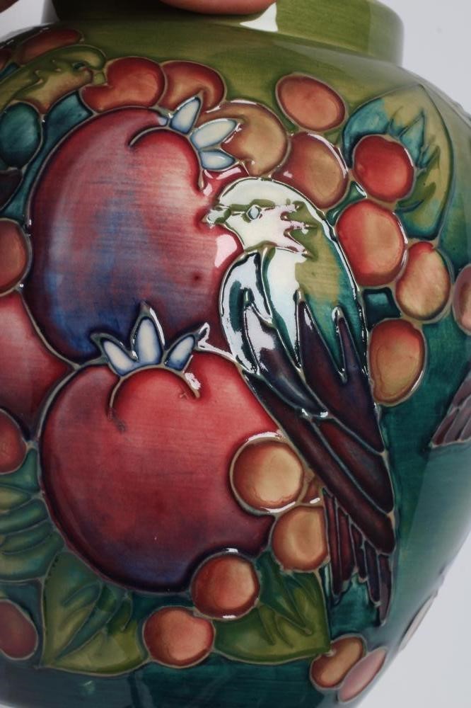 A MOORCROFT POTTERY FINCHES JAR AND COVER, 1991, painted in typical colours designed by Sally Image