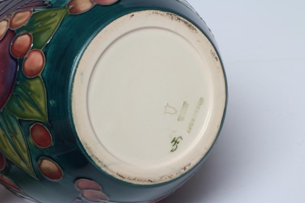 A MOORCROFT POTTERY FINCHES JAR AND COVER, 1991, painted in typical colours designed by Sally Image