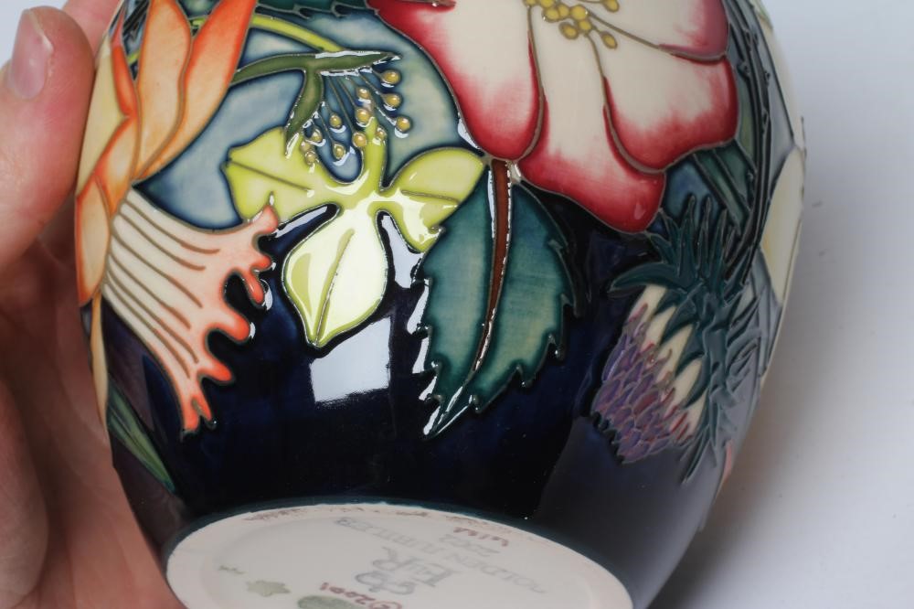 TWO MOORCROFT POTTERY JARS AND COVERS Image
