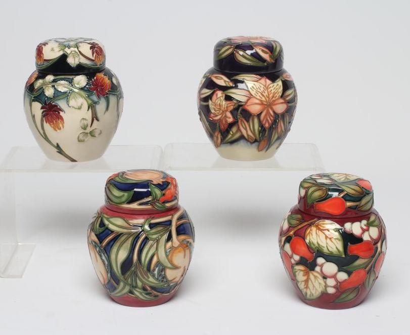 TWO MOORCROFT POTTERY SMALL JARS AND COVERS Image