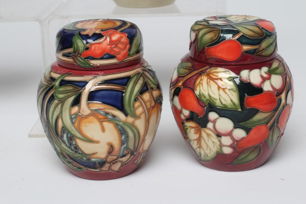 TWO MOORCROFT POTTERY SMALL JARS AND COVERS Image