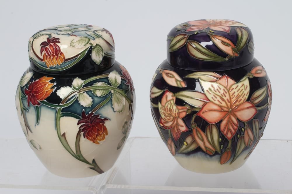 TWO MOORCROFT POTTERY SMALL JARS AND COVERS Image